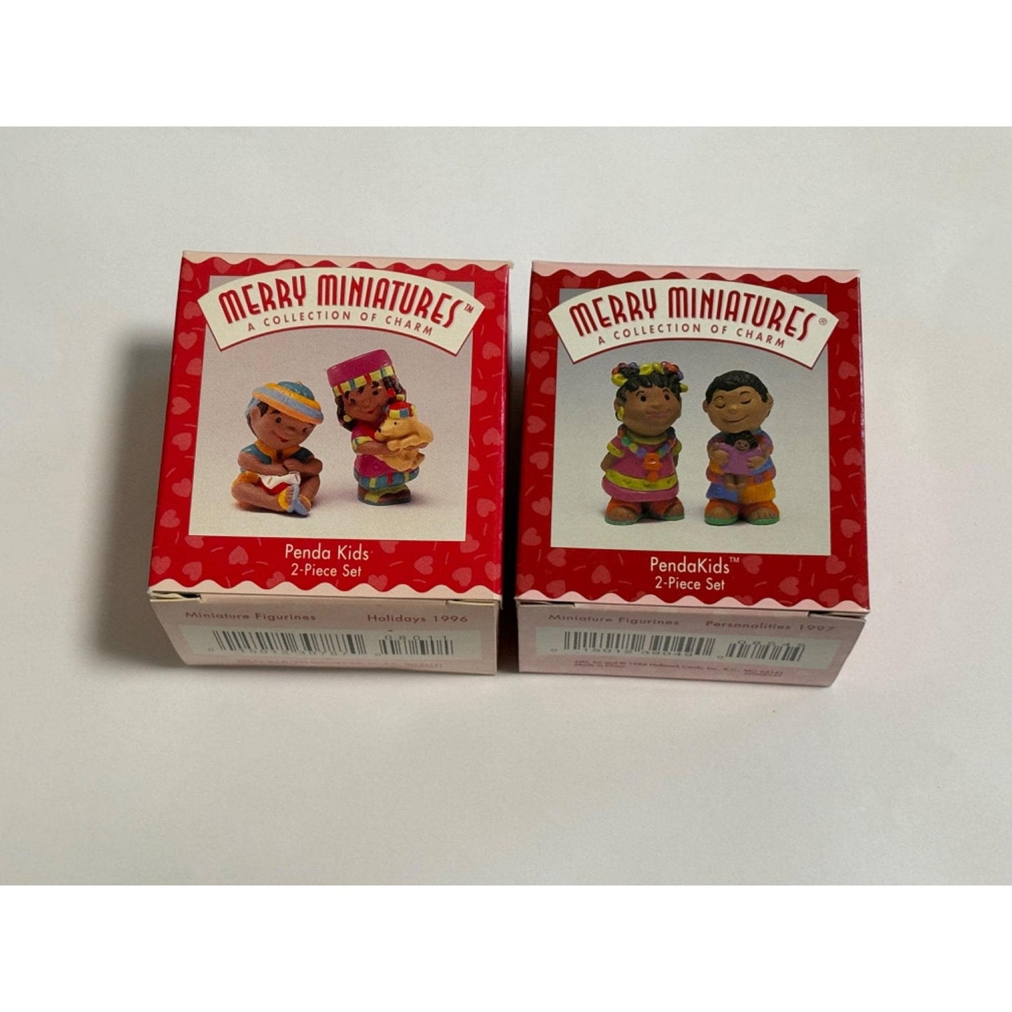 Lot of 2 Hallmark Ornaments Merry Miniatures Penda Kids Of Charm 1995 1996